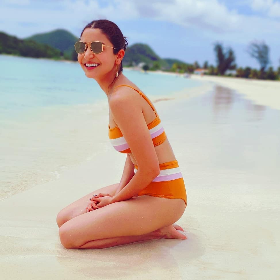 Anushka Sharma looked glorious in the orange and white striped bikini