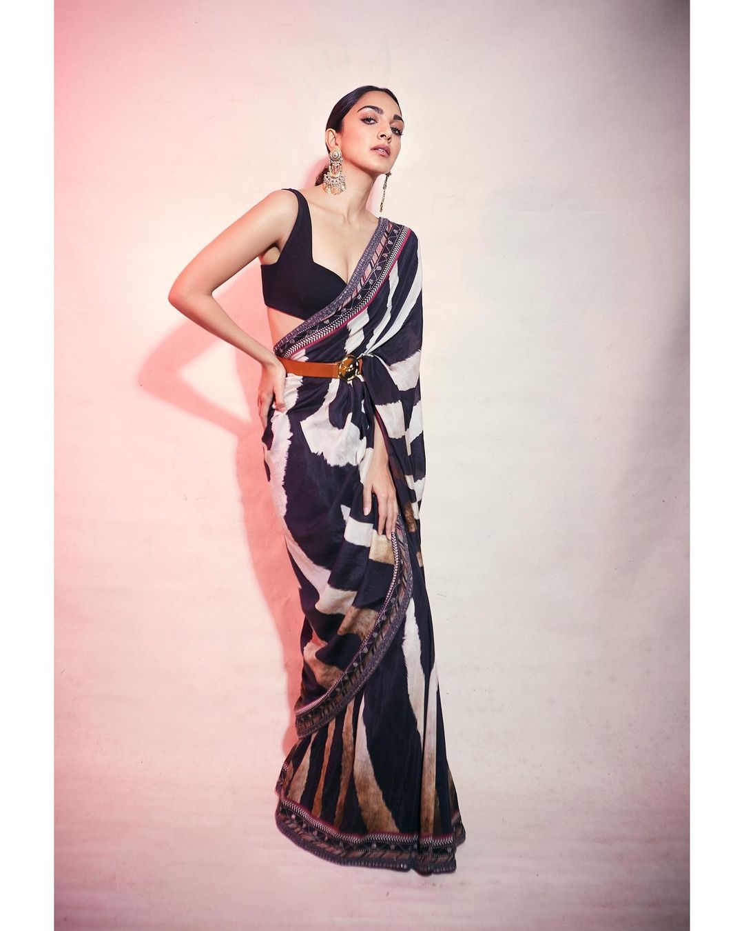 Kiara Advani looks flawless in the black and white chiffon saree