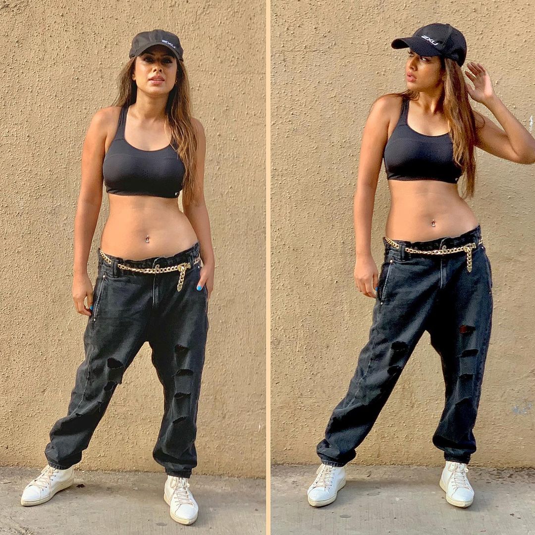 Nia Sharma looks sporty chic in the black denims and sports bra.