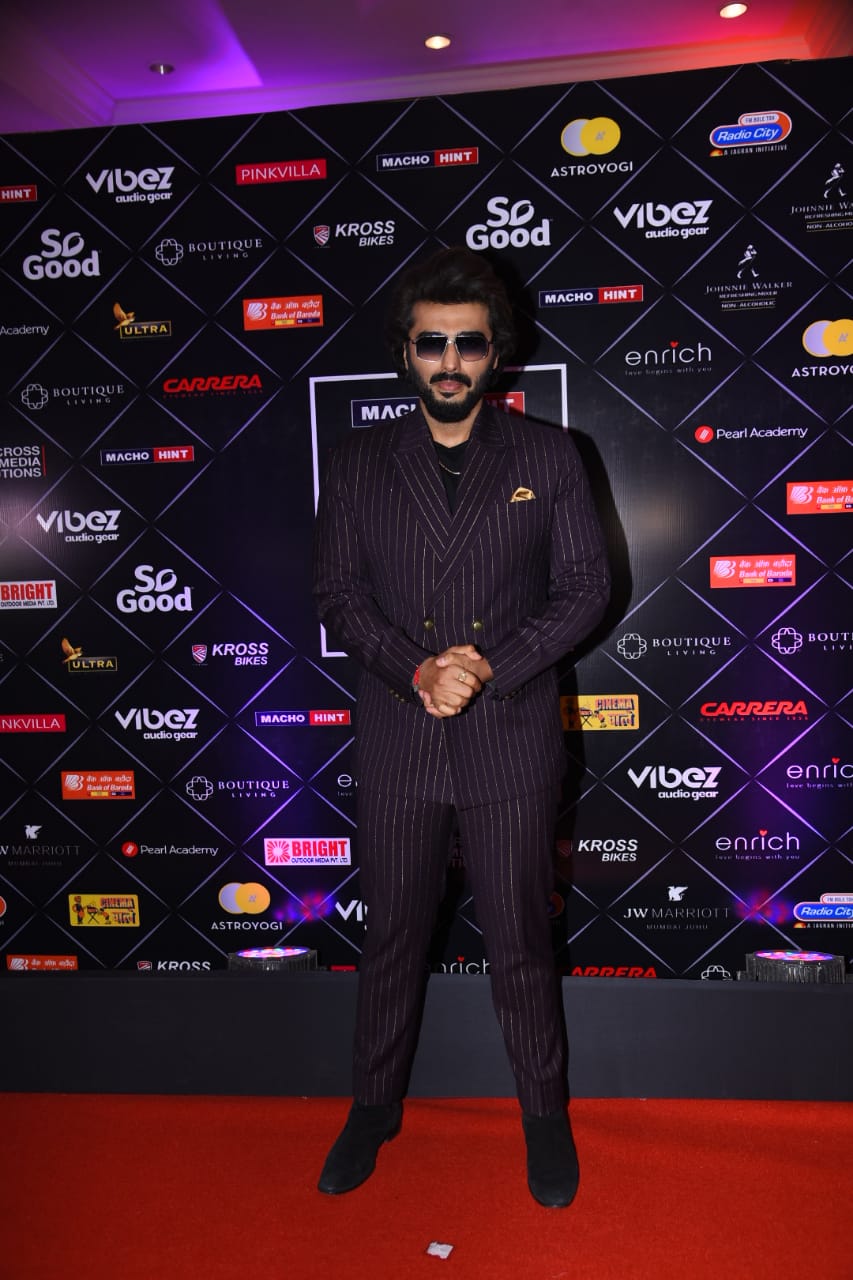 Arjun Kapoor looks smart in a striped suit at the Pinkvilla Style Icons Awards.