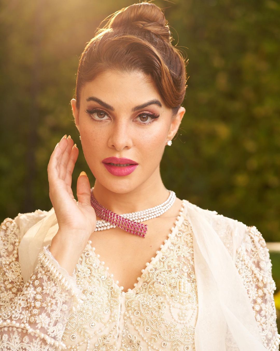 Jacqueline Fernandez looks drop-dead gorgeous in the ivory white look with the statement neckpiece.
