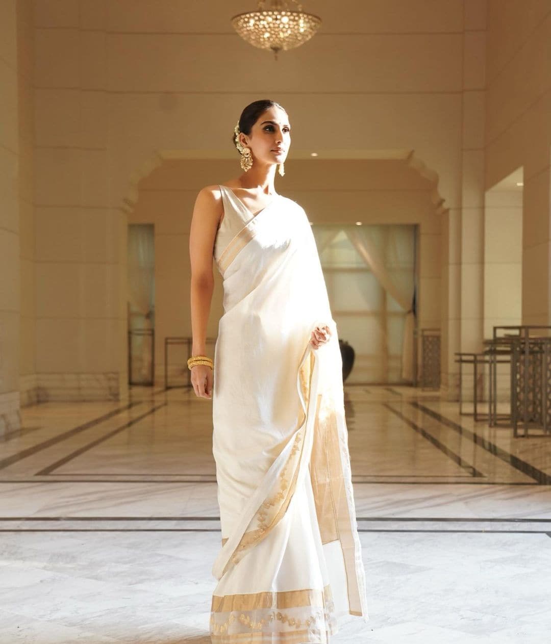 Vaani Kapoor looks graceful in the white saree