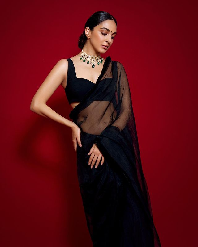 Kiara Advani is a picture of grace in the black sheer saree