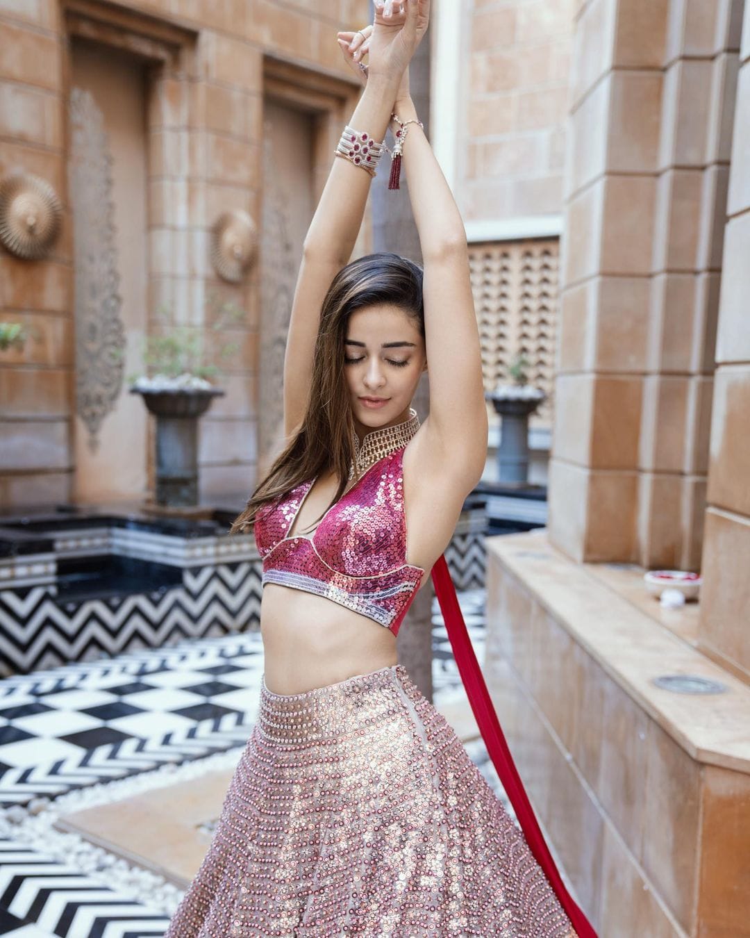 Ananya Panday looks drop-dead gorgeous in the sequinned lehenga.