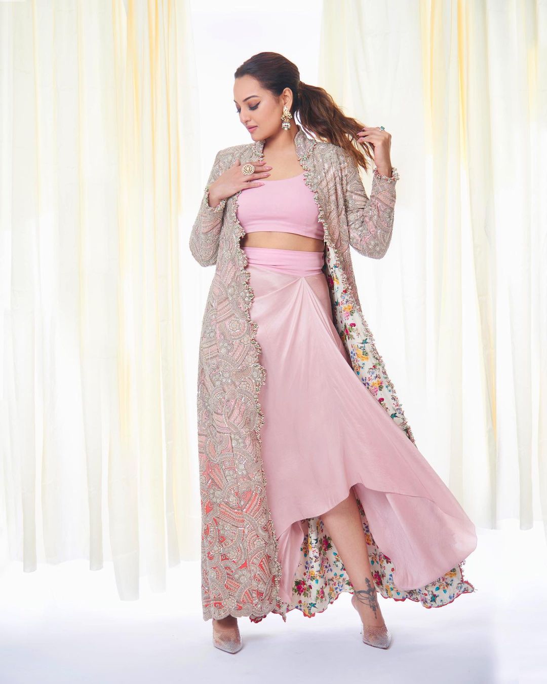 Sonakshi Sinha cuts a striking figure in a pink skirt set with an embellished jacket