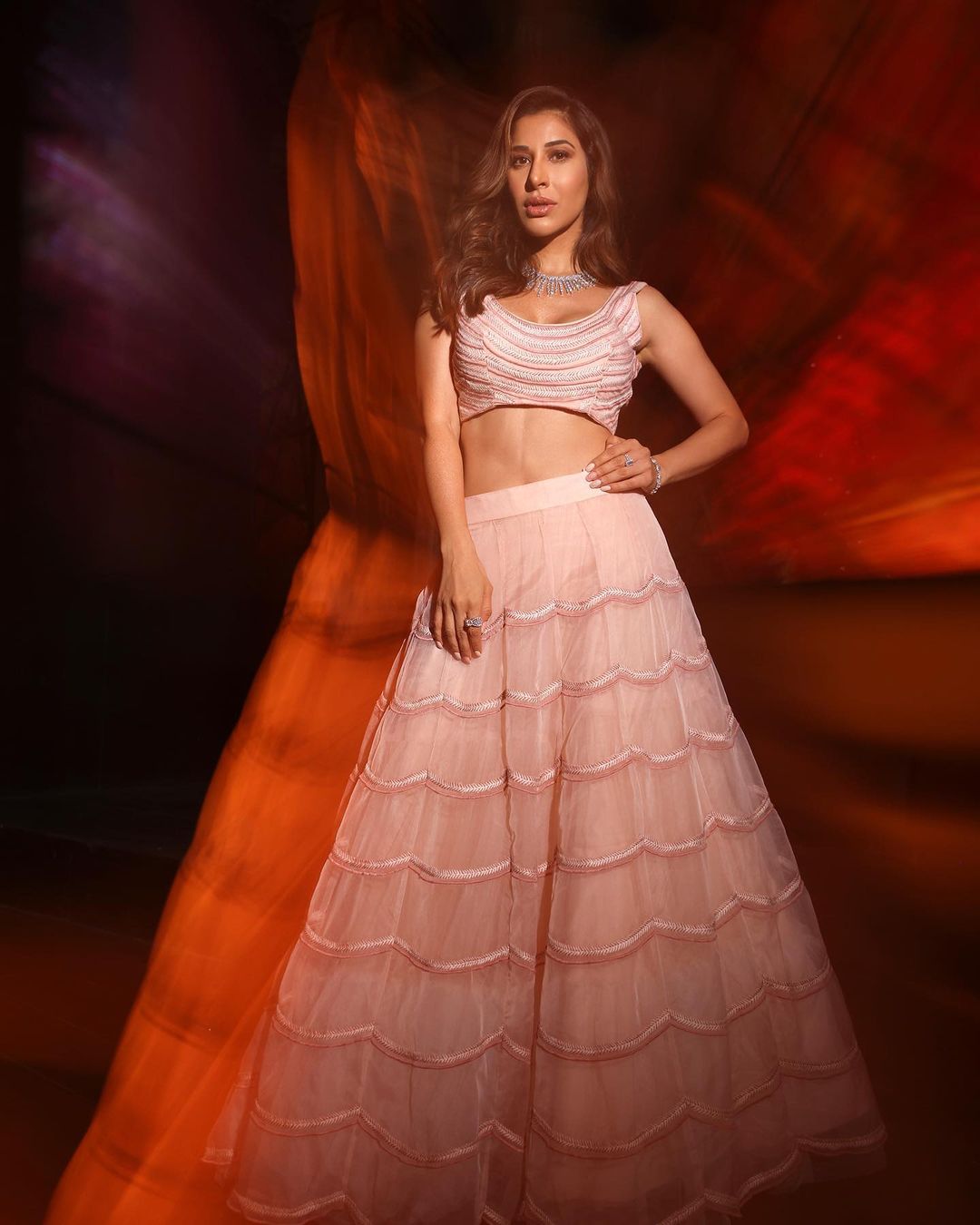 Sophie Choudry looks regal in the pastel pink striped lehenga and matching choli