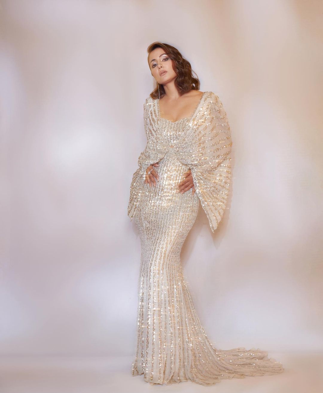 Hina Khan Looks Ravishing In White Shimmering Bodycon Gown