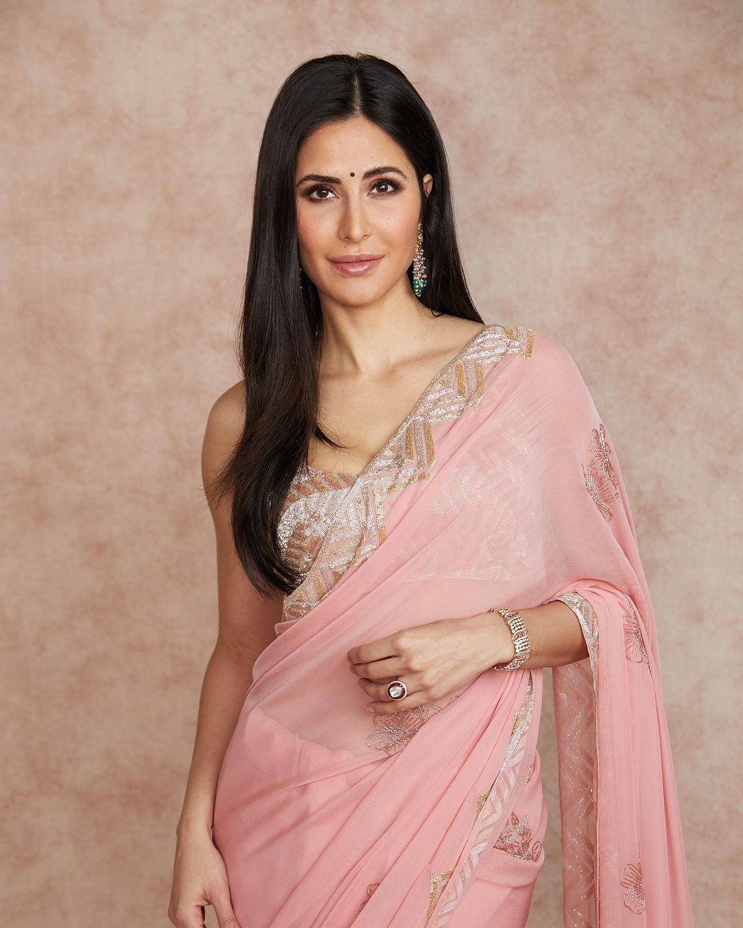 Making a case for desi glamour, Katrina opted for a soft pink saree by Manish Malhotra for her Diwali celebration.