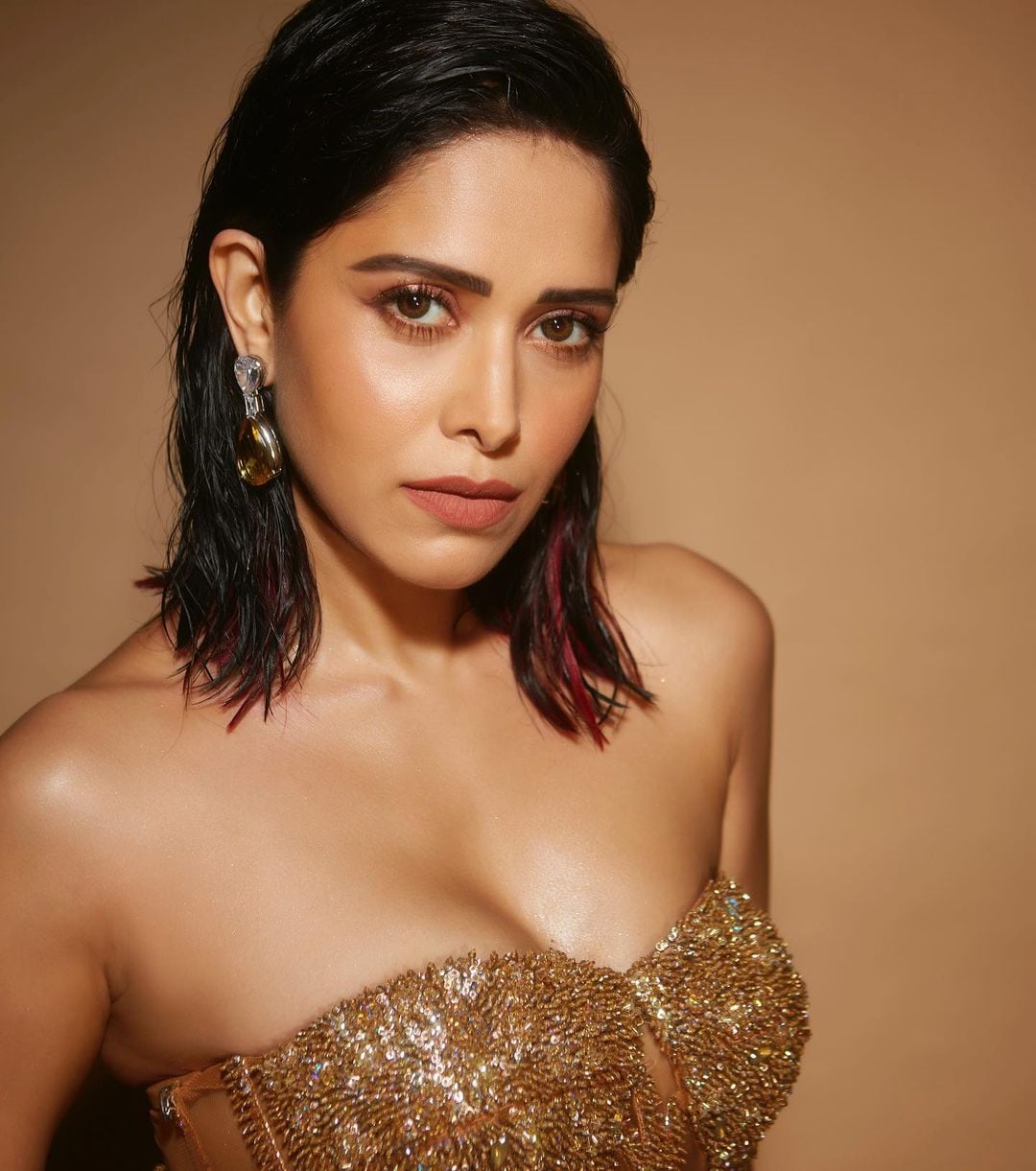 Nushrratt Bharuccha oozes oomph in the cleavage-baring off-shoulder outfit.