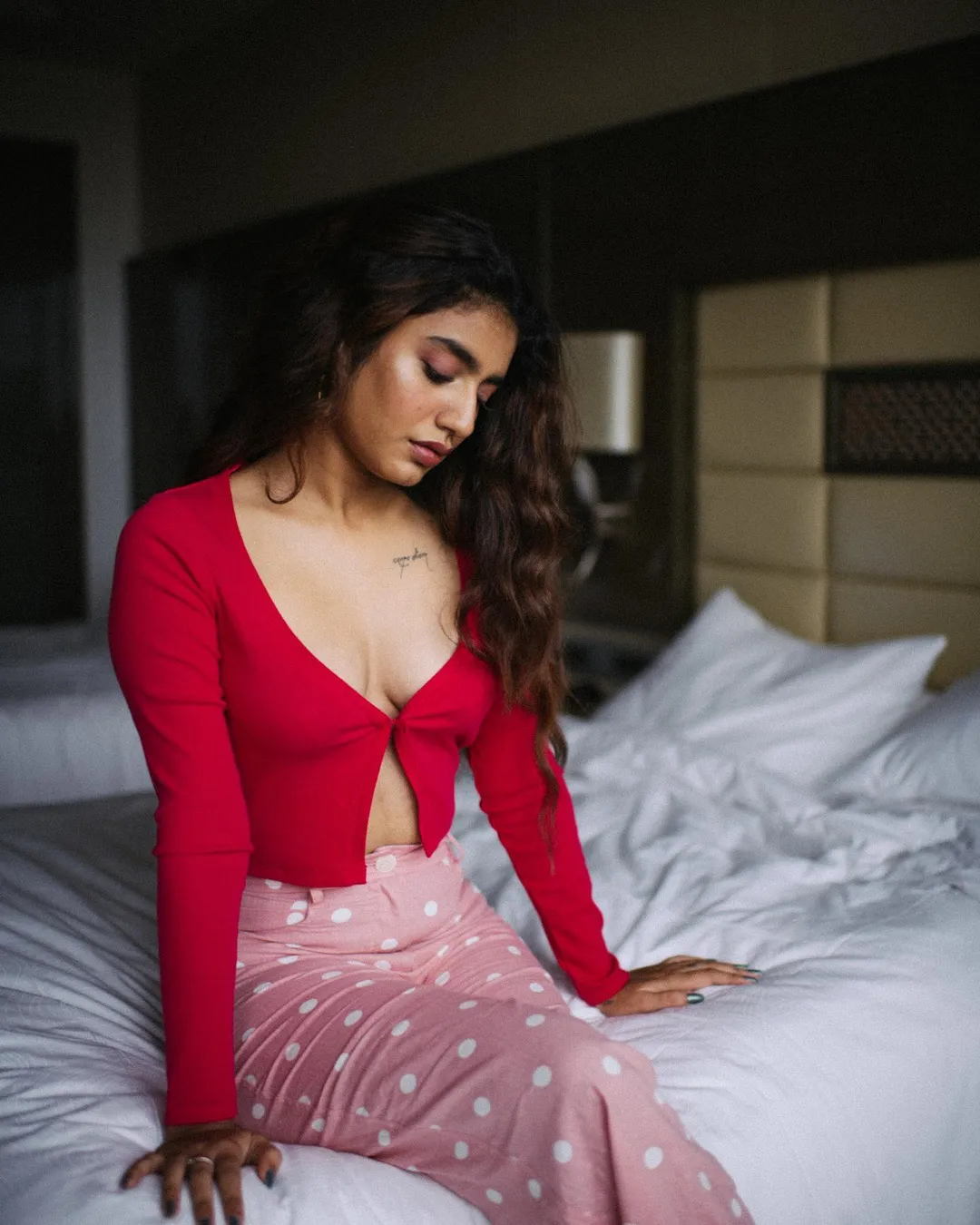 Priya Prakash Varrier looks sizzling hot in red top featuring plunging neckline