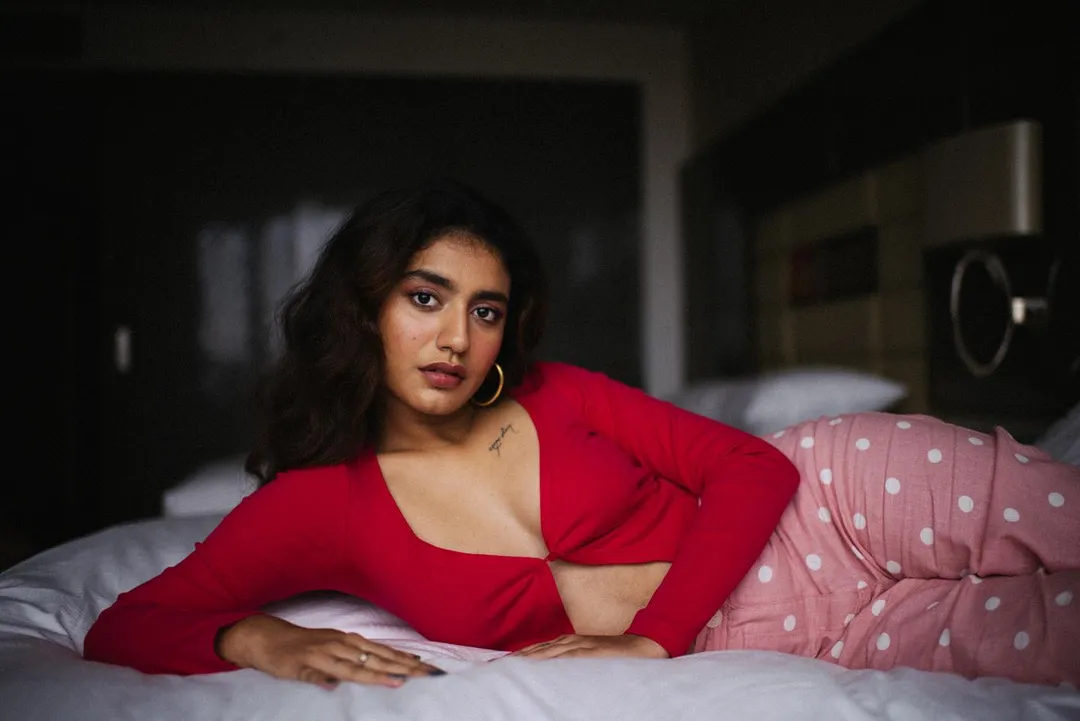 Priya Prakash Varrier was pictured posing on her bed in this gorgeous social media post. Her most recent outfit of the day is ideal for a date night.