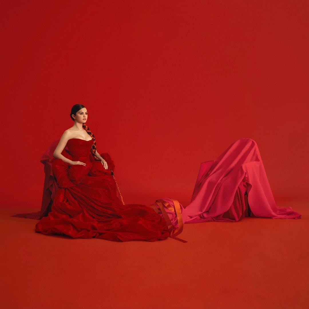 Sharing this oh-so-classy picture in a long red gown - Selena Gomez