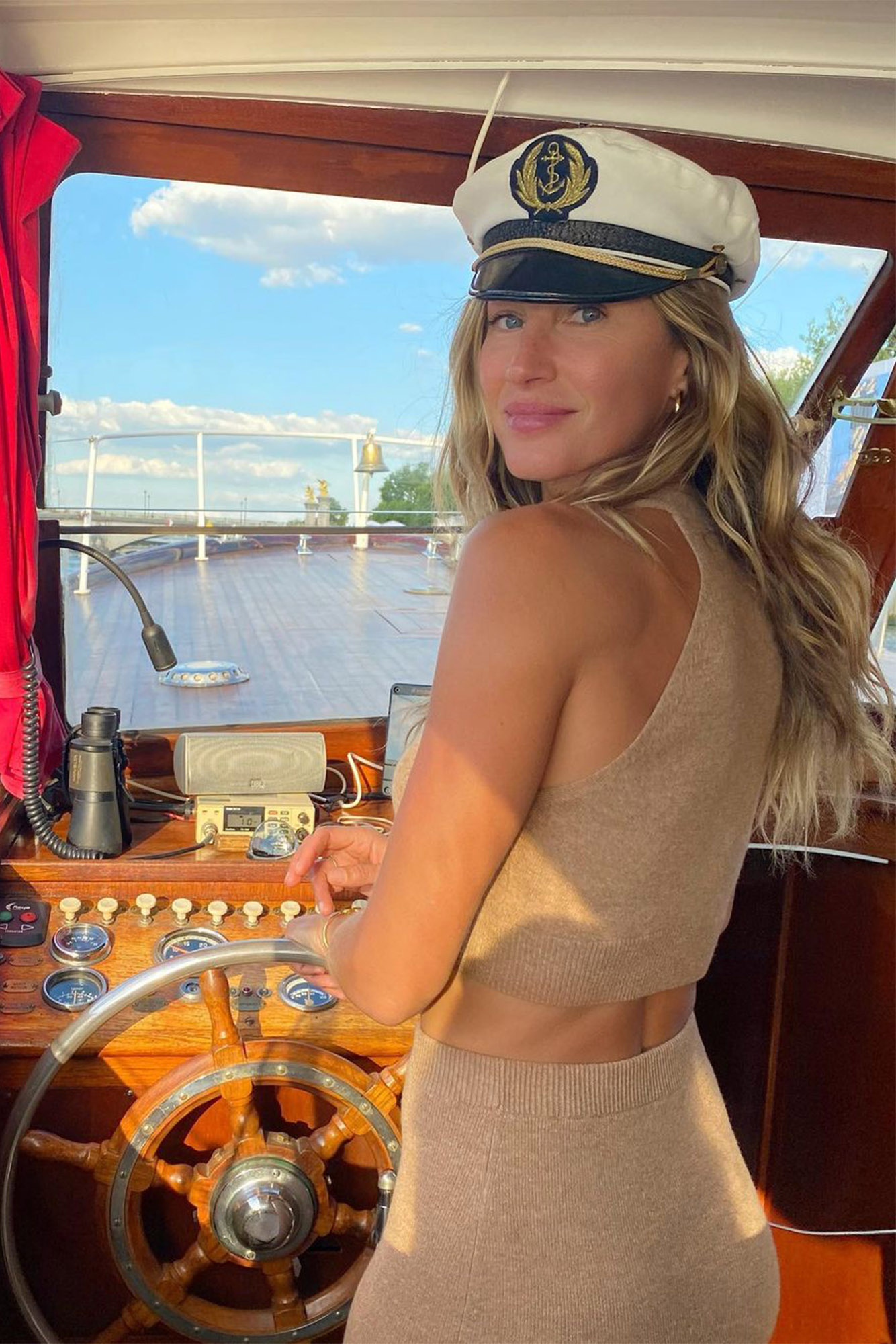 BABE AHOY!: Gisele BÃ¼ndchen sure knows how to model a captain's hat, even if the rest of her 'fit isn't on-brand while onboard.