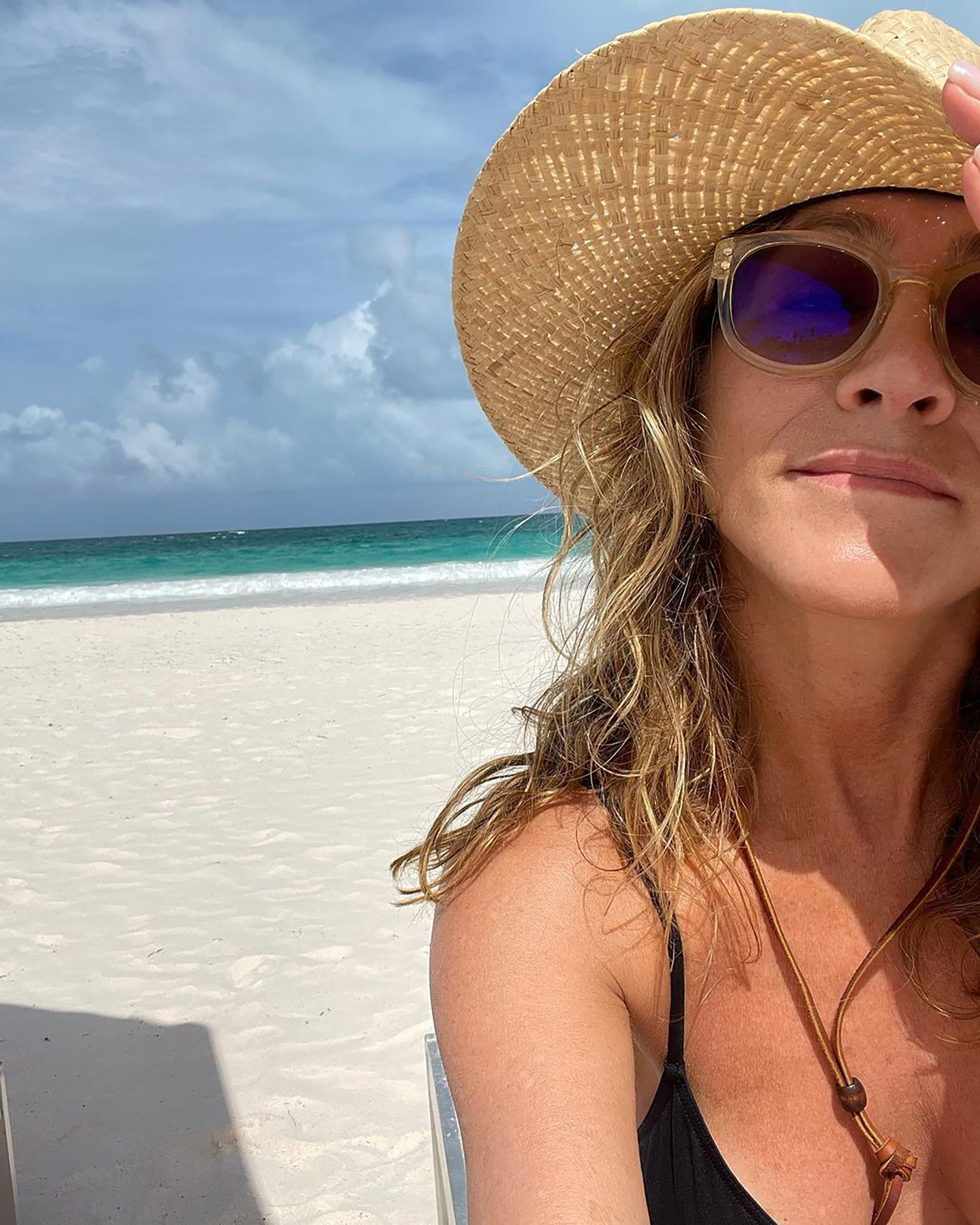 Jennifer Aniston enjoys a day on the beach.