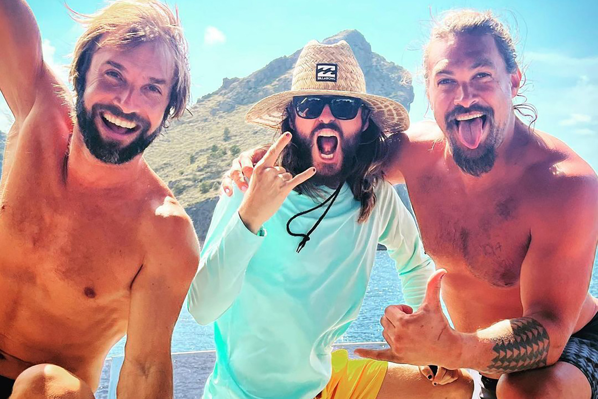 ADVENTURE TIME: Jared Leto (center) grabs his friends Chris Sharma (left) and Jason Momoa to explore the distant land of Mallorca, Spain.