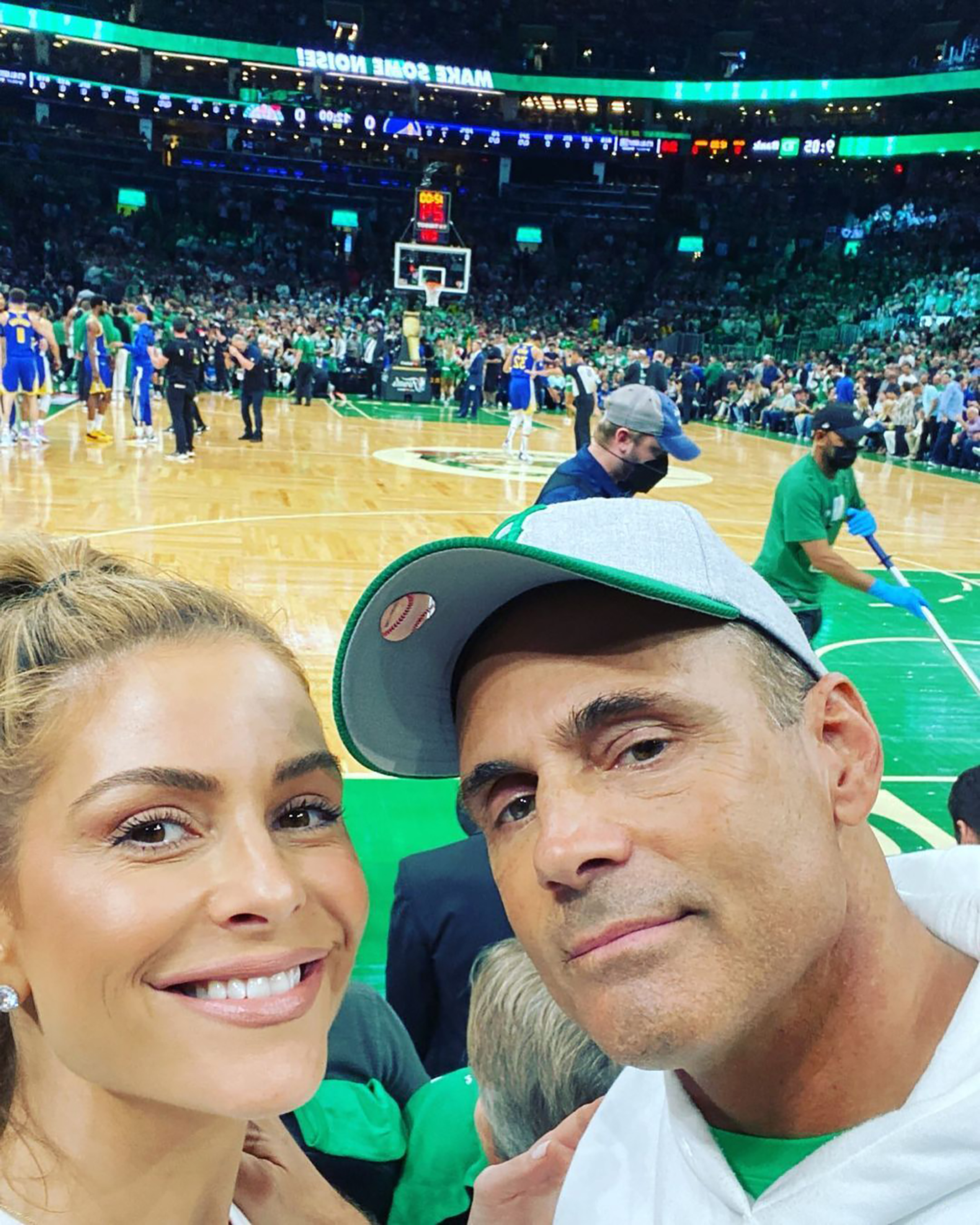 Maria Menounos and her husband cheer on the Boston Celtics.