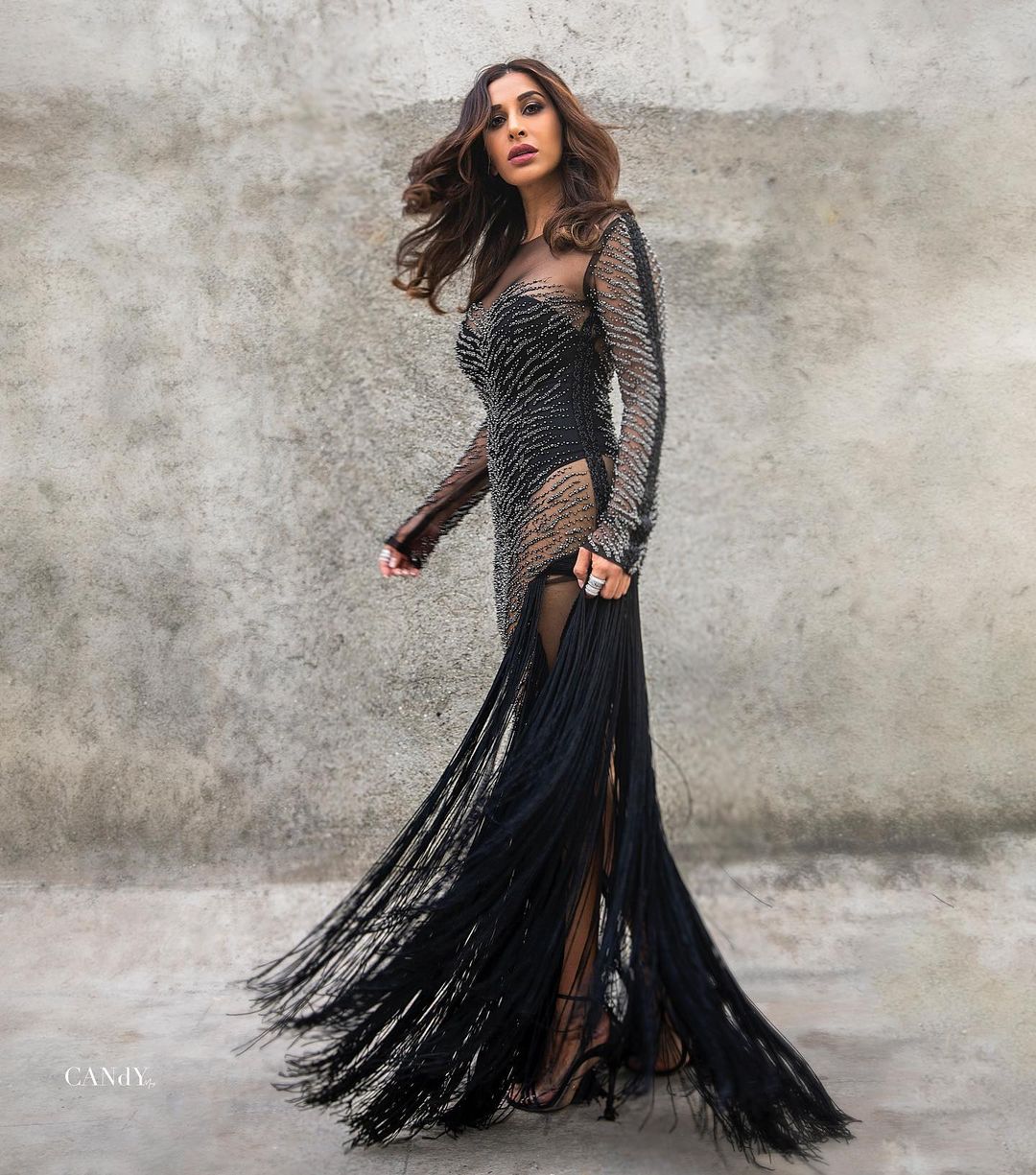 Sophie Choudry aces the semi-sheer tassel dress like a boss babe.