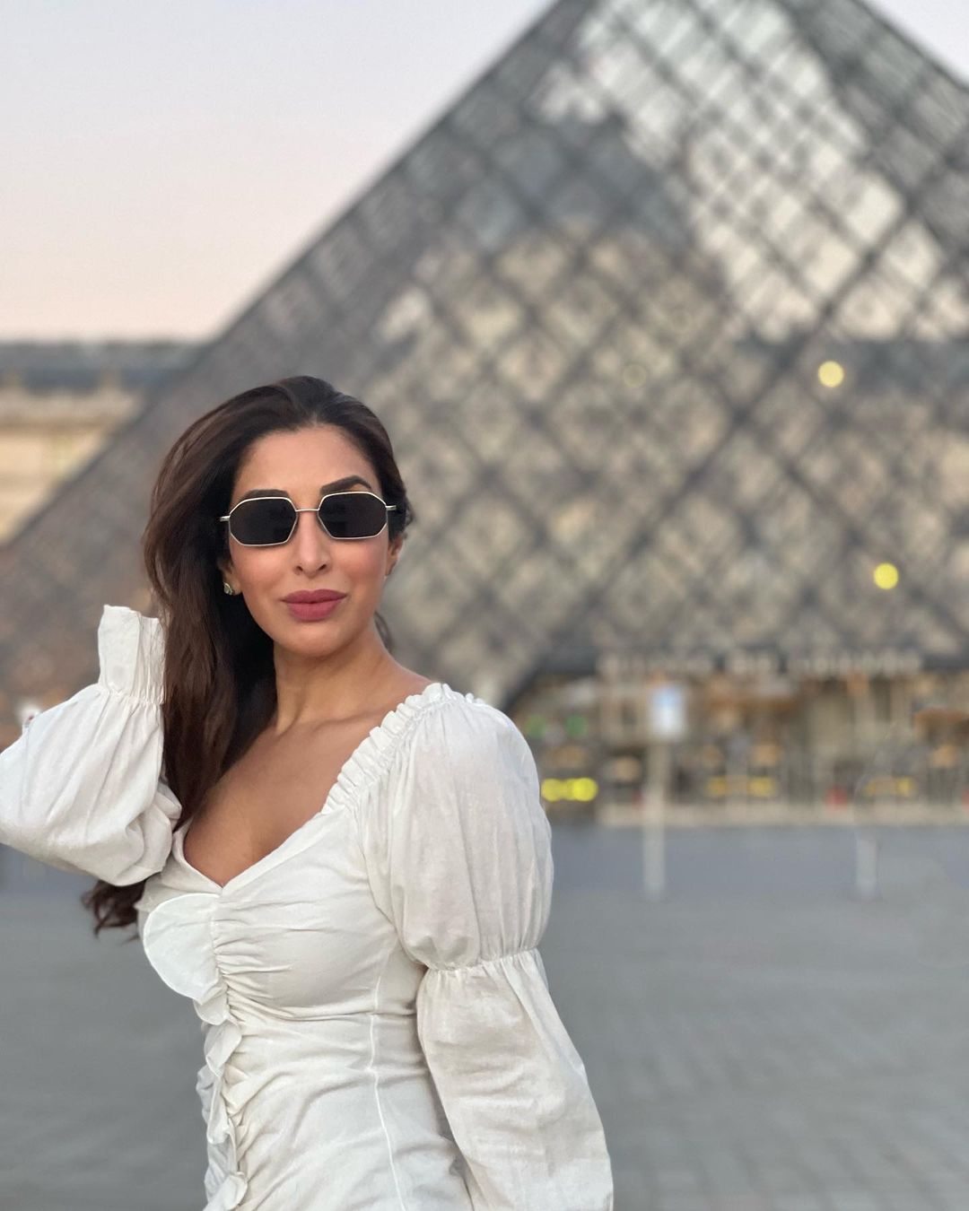 Sophie Choudry can be seen striking a pose in white outfits