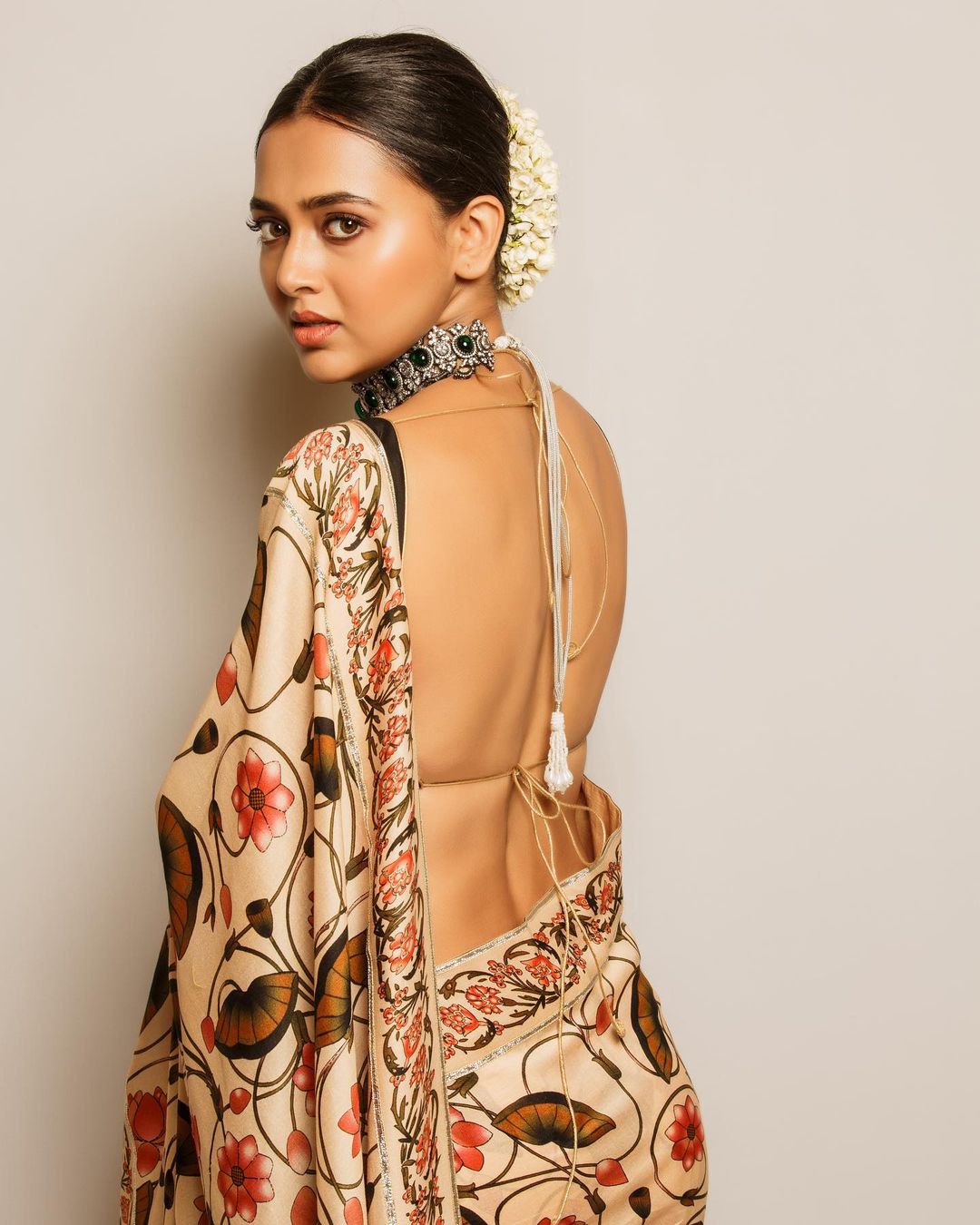 Tejasswi Prakash is looking stellar in a floral saree with backless blouse