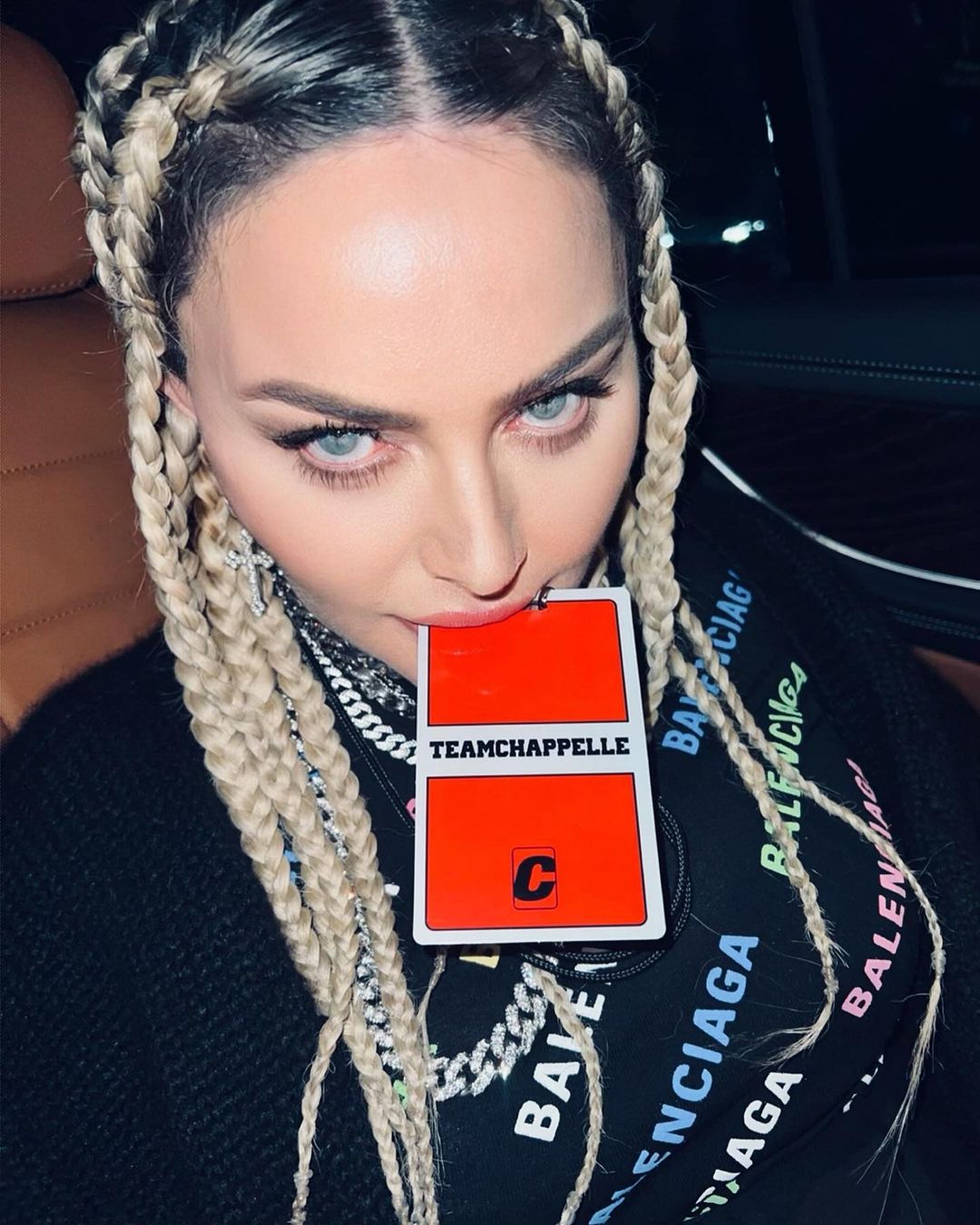 Madonna can be seen in braided blonde hair and a black Balenciaga sweatshirt. She captioned it, â€œLast Night was Strange, and disturbing for so many reasons!