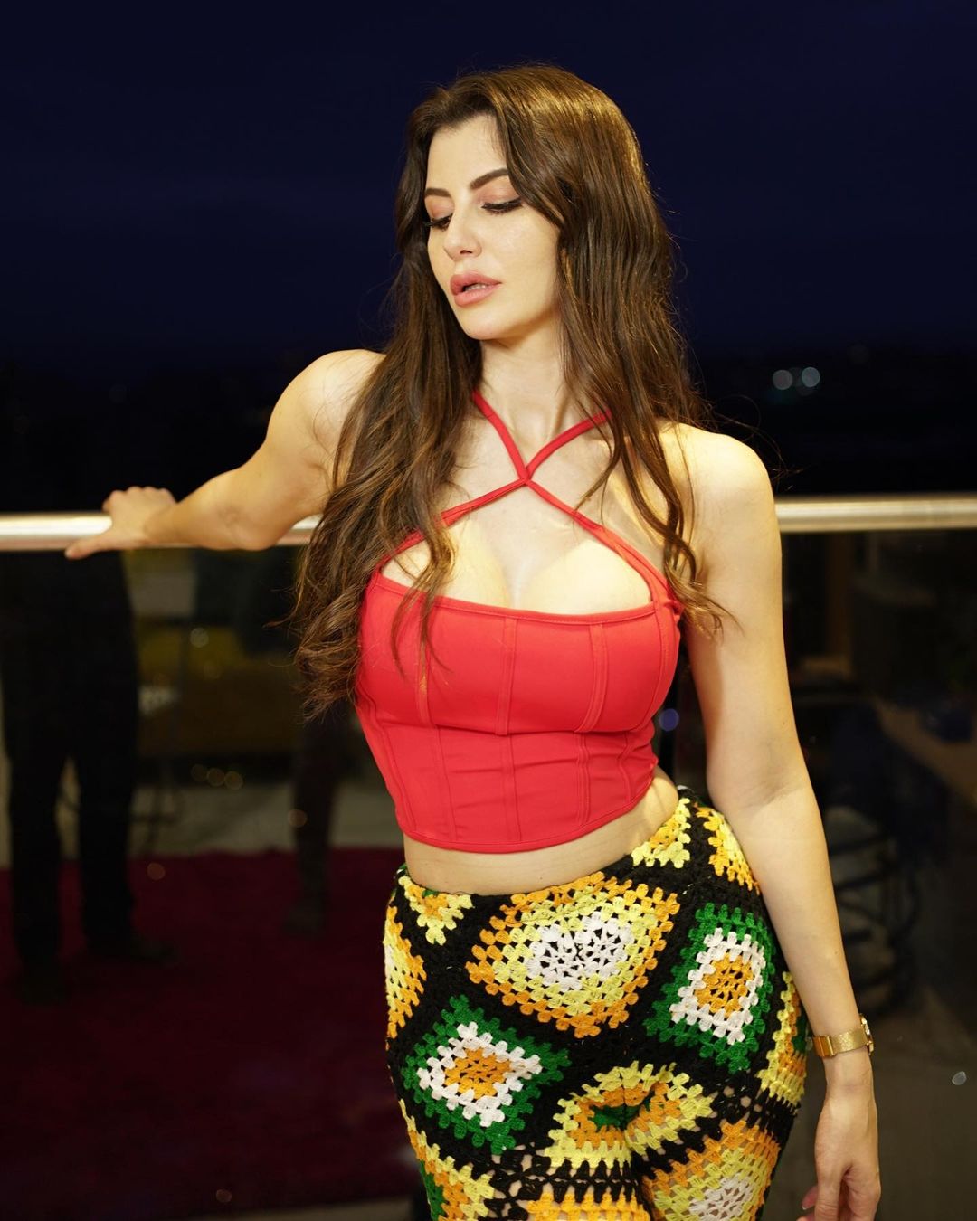 Giorgia Andriani looks sexy in the red top and colourful pants