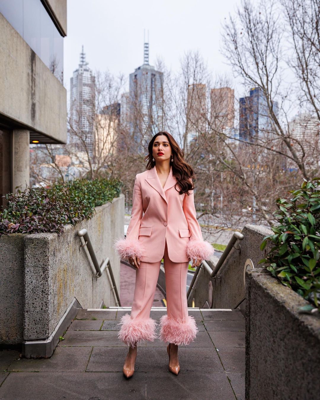 Tamannaah Bhatia in a pink pantsuit with feather highlights is a gorgeous sight to behold