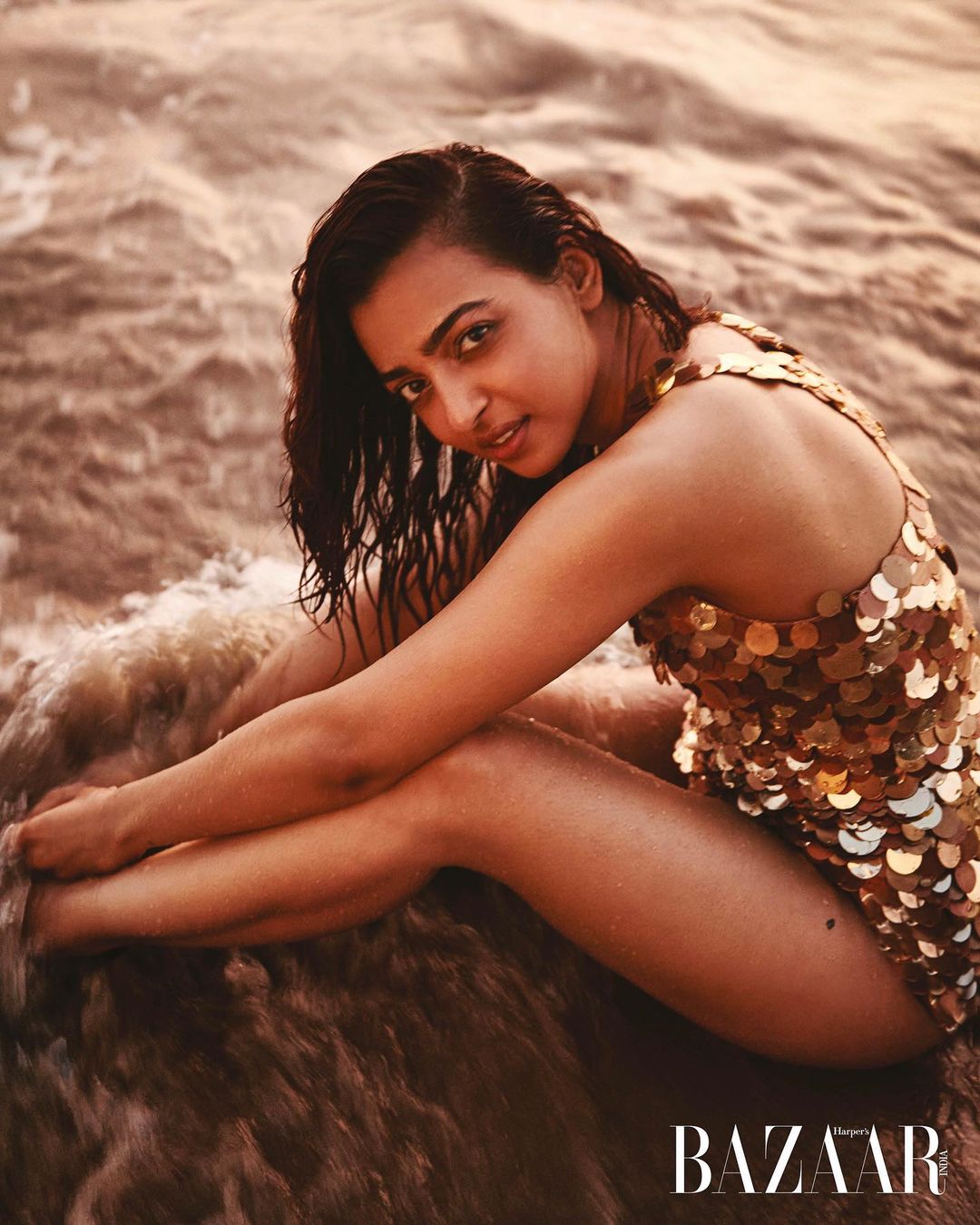 Radhika Apte oozes sexiness in the golden swimsuit