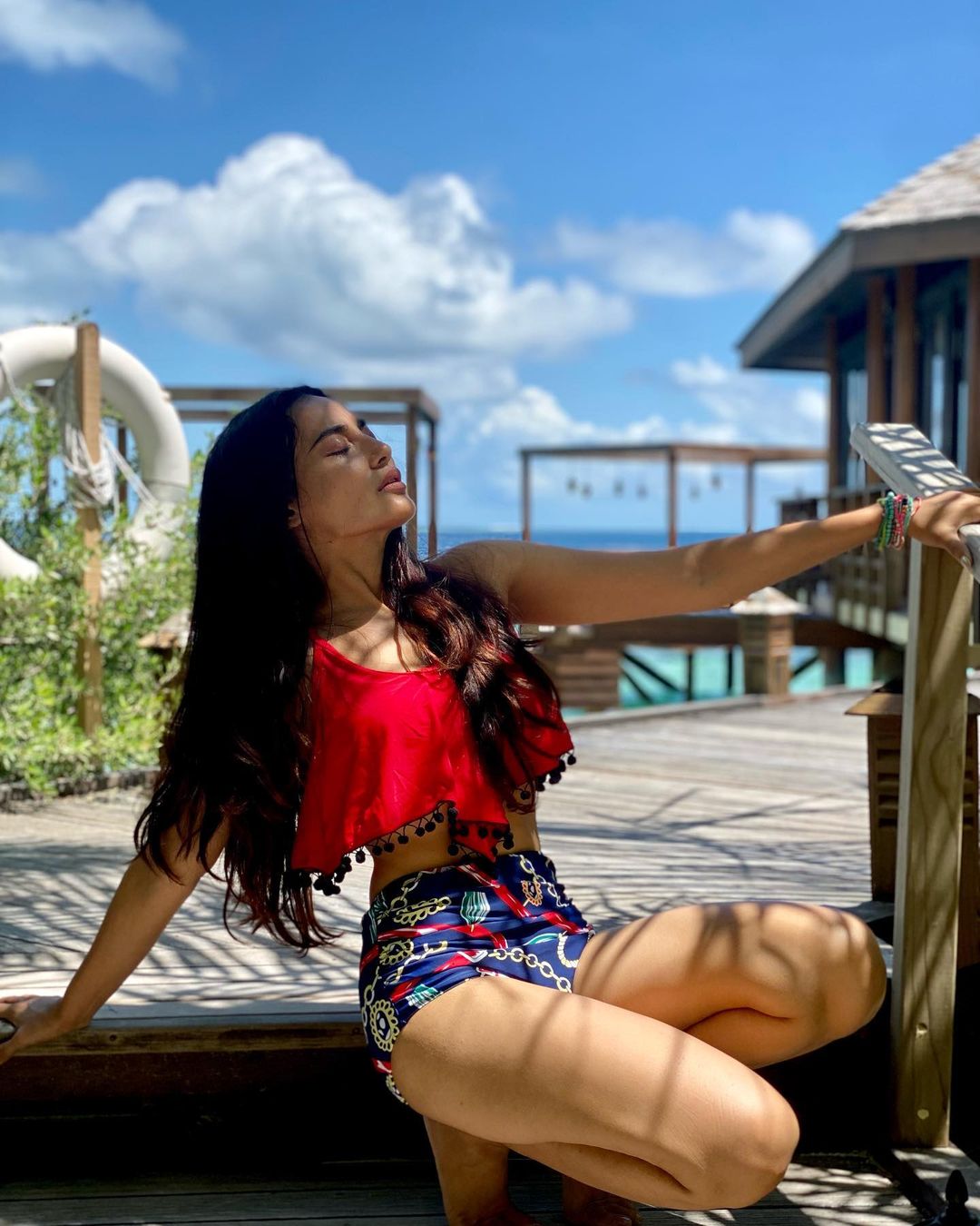 Surbhi Jyoti looks sexy in a colourful swimwear set while holidaying in Maldives.