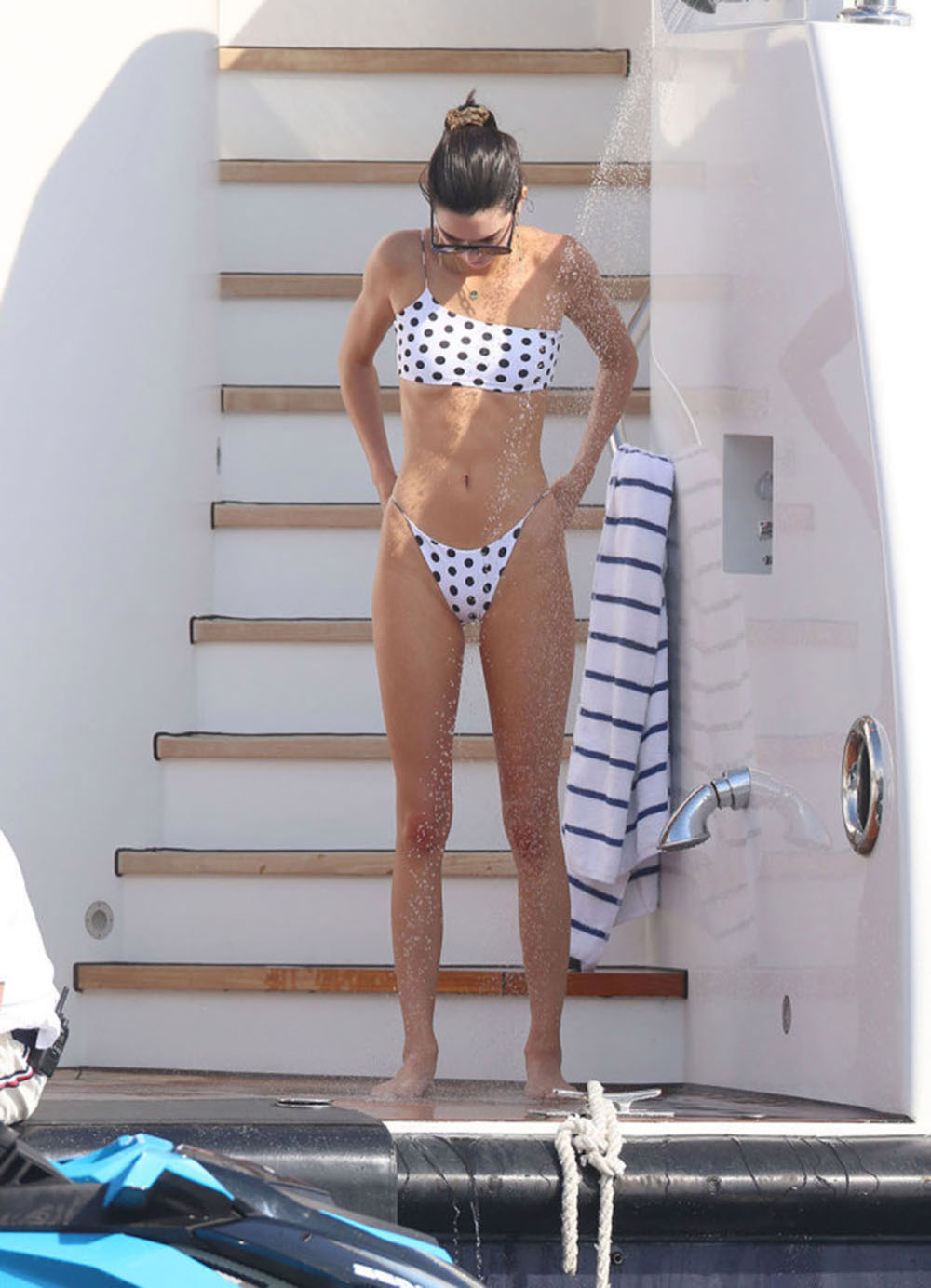 Kendall Jenner rocks a one-shouldered bikini while hanging on a boat in Monaco, France. She showered off on the ship after going on a jet ski ride.