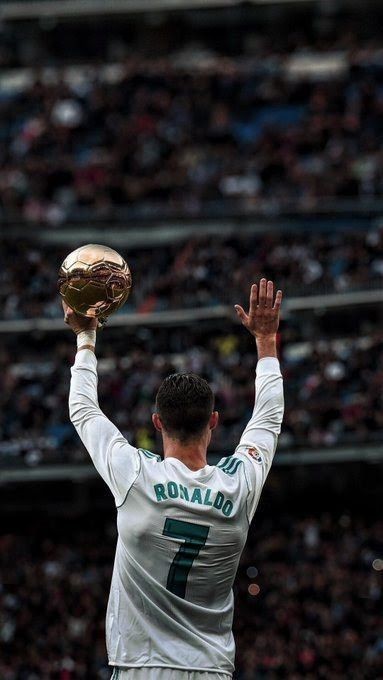 Download Kneeling Cristiano Ronaldo iPhone Wallpaper | Wallpapers.com