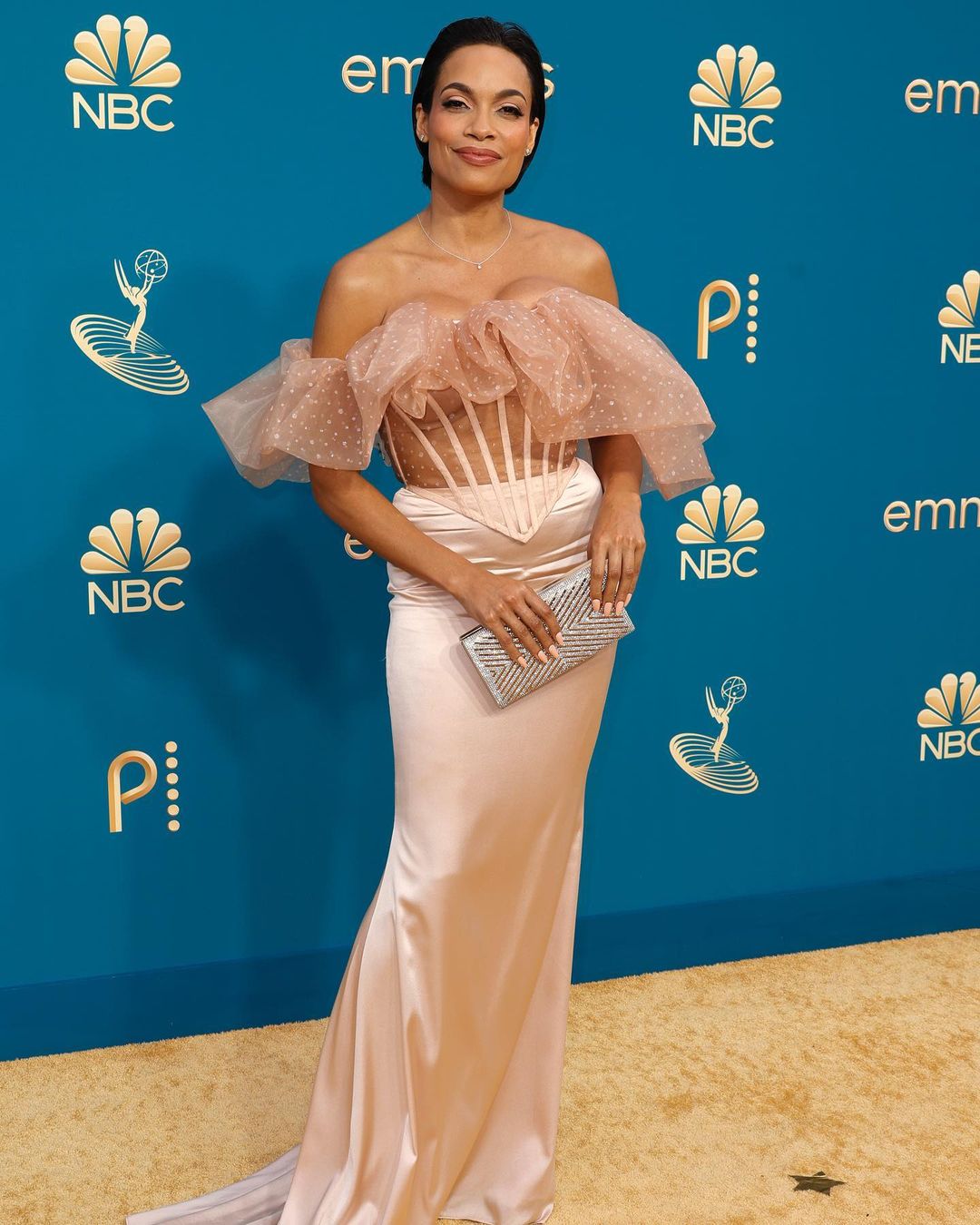 Rosario Dawson looks lovely in a Christian Siriano corset top and satin skirt