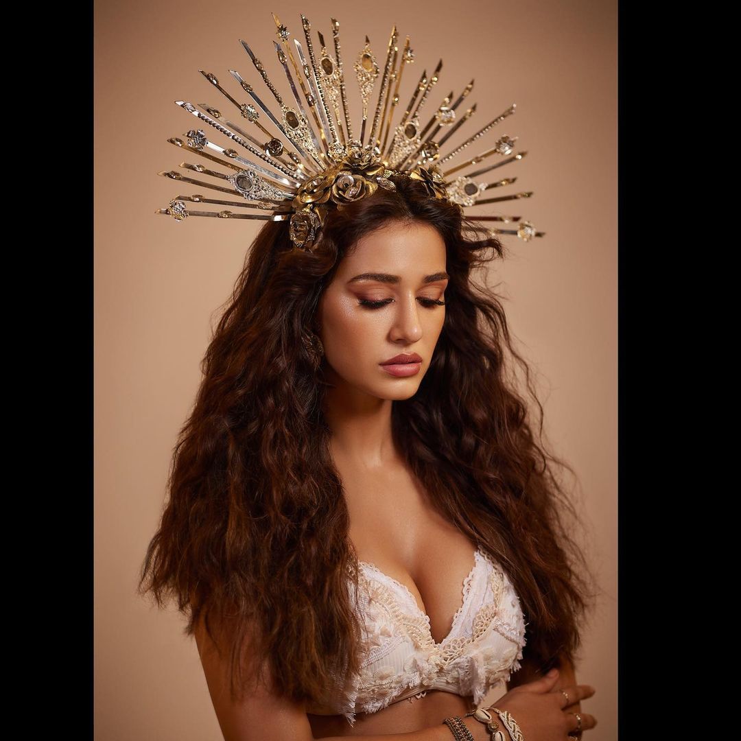 Disha Patani looks like a sass queen in her latest photoshoot, where the actress can be seen wearing a crown with a white bralette