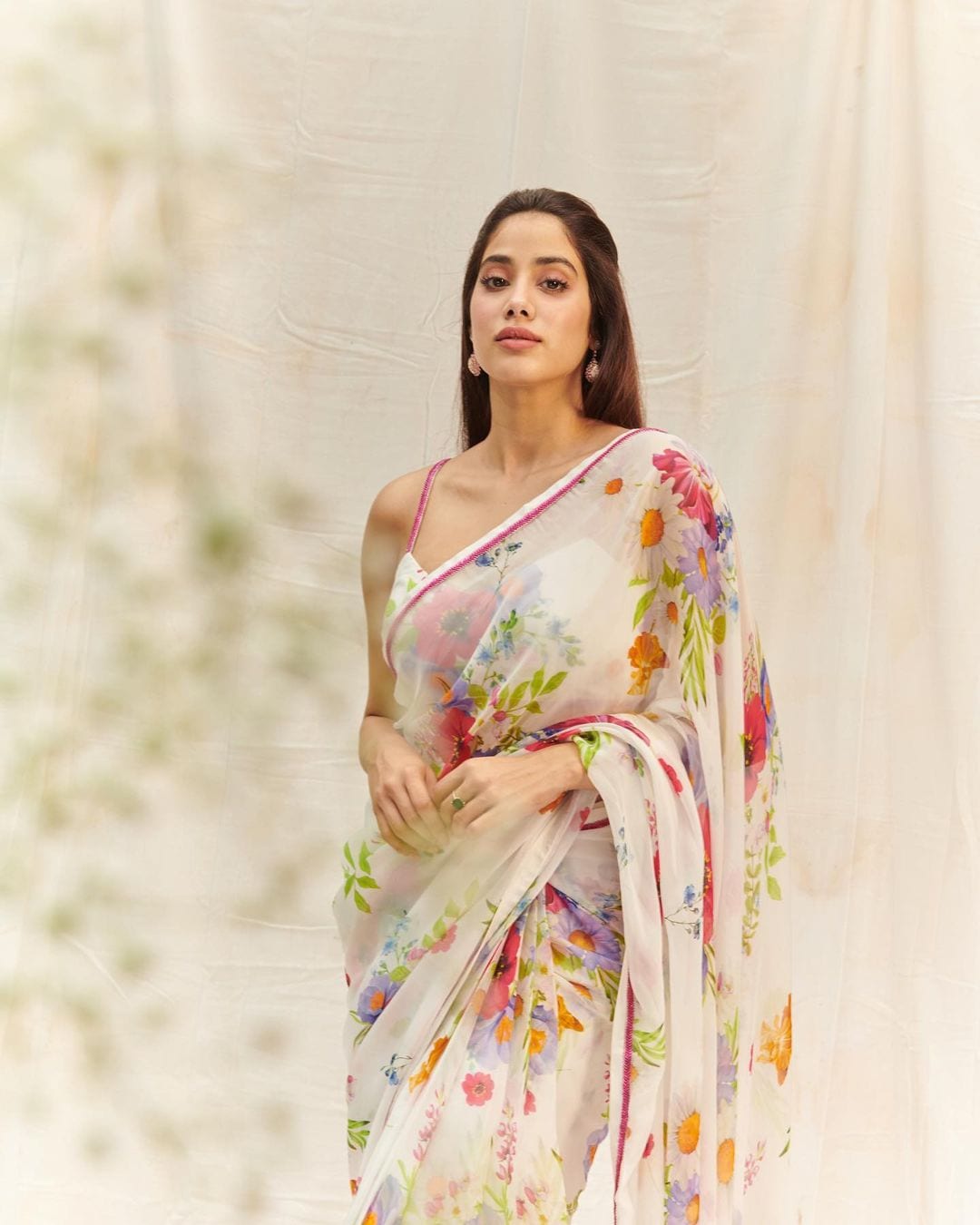 Janhvi Kapoor looks pretty in a floral-printed chiffon saree