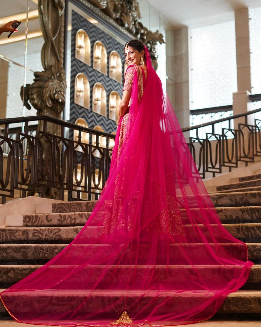 Aahana Kumra looks regal in the bright pink dupatta.