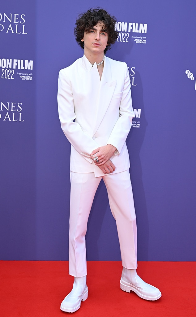 Actor TimothÃ©e Chalamet wows in a white slim suit and platform boots at the Bones & All premiere during the 66th BFI London Film Festival.