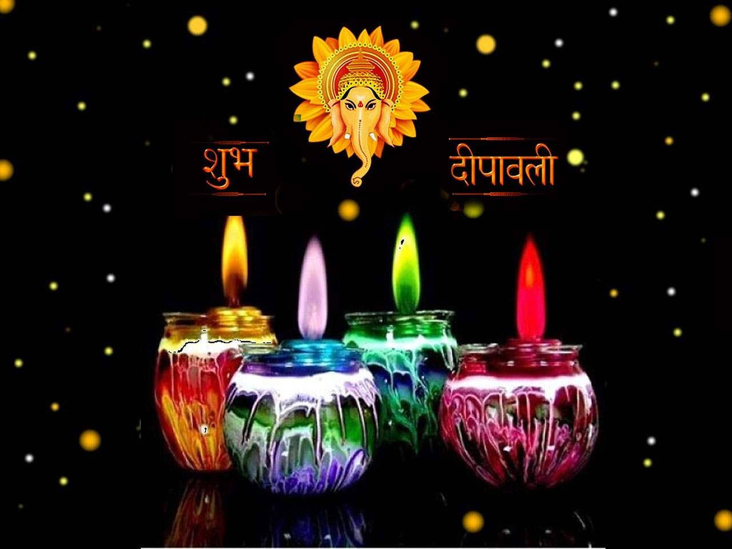 Wonderful Display Of Diwali Candles Of Various Colors Illuminated On A Dark Background With Luminous Light.