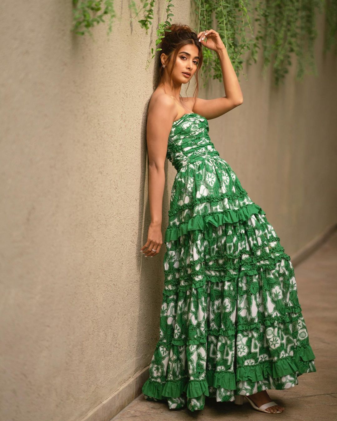 Pooja Hegde gives boho chic vibes in the printed green tiered dress