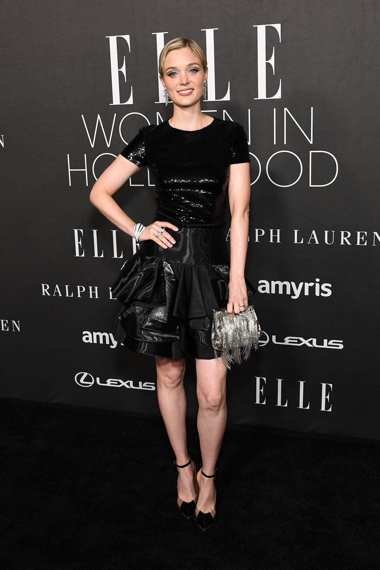 Bella Heathcote wears Ralph Lauren Collection at the Elle Women in Hollywood 2022 celebration.