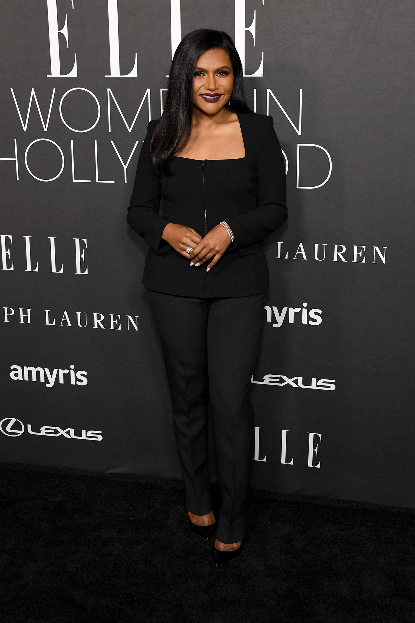 Mindy Kaling wears Ralph Lauren Collection at the Elle Women in Hollywood 2022 celebration.