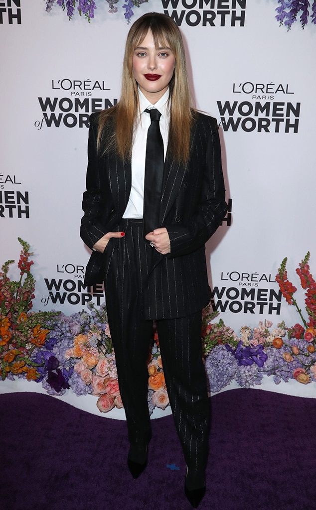 Actress Katherine Langford rocks a pin stripe suit and tie at the L'Oreal Paris Women of Worth event in LA