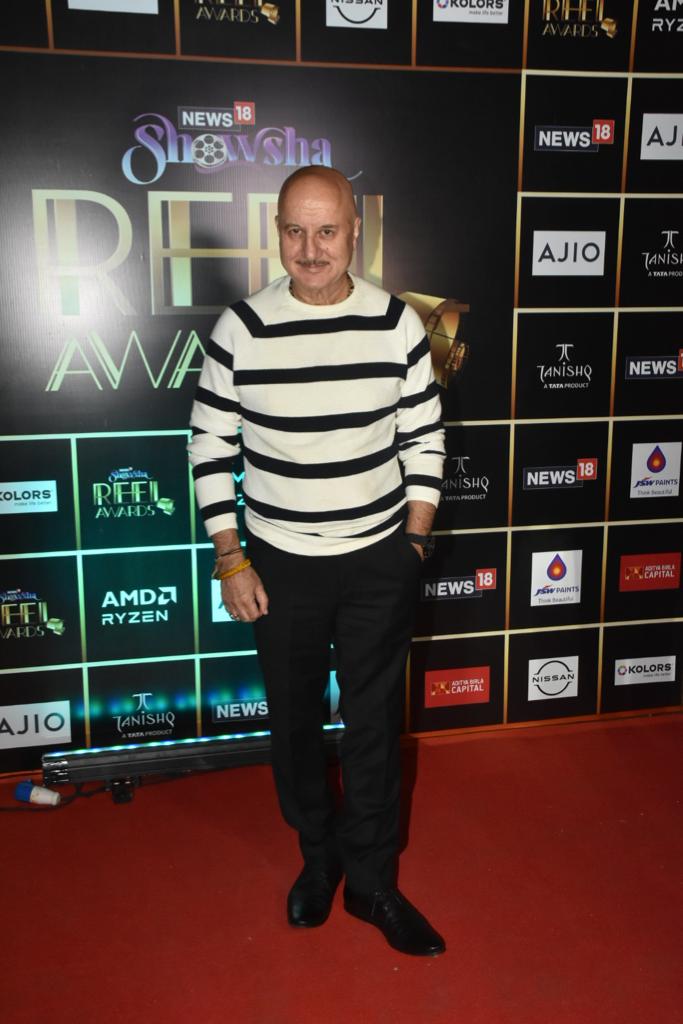 Anupam Kher in striped cardigan at the News18 Showsha Reel Awards 2023