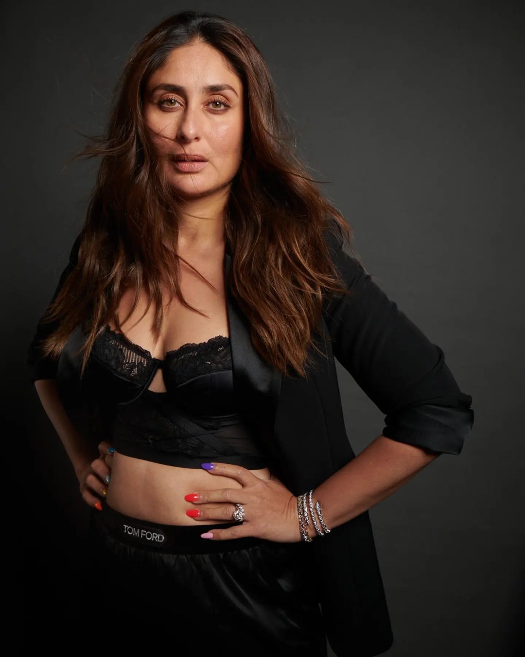 Kareena Kapoor Khan wears the suit with a black lace bralette