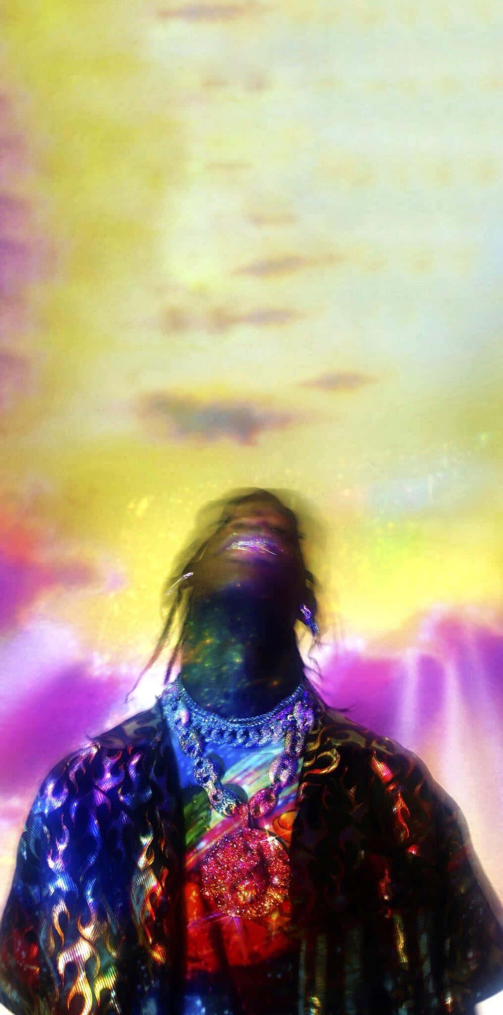Beautiful Wallpaper Featuring A Stylized Portrait Photograph Of The American Rapper Gunna Wearing A Colorful Outfit On An Equally Colorful Backdrop
