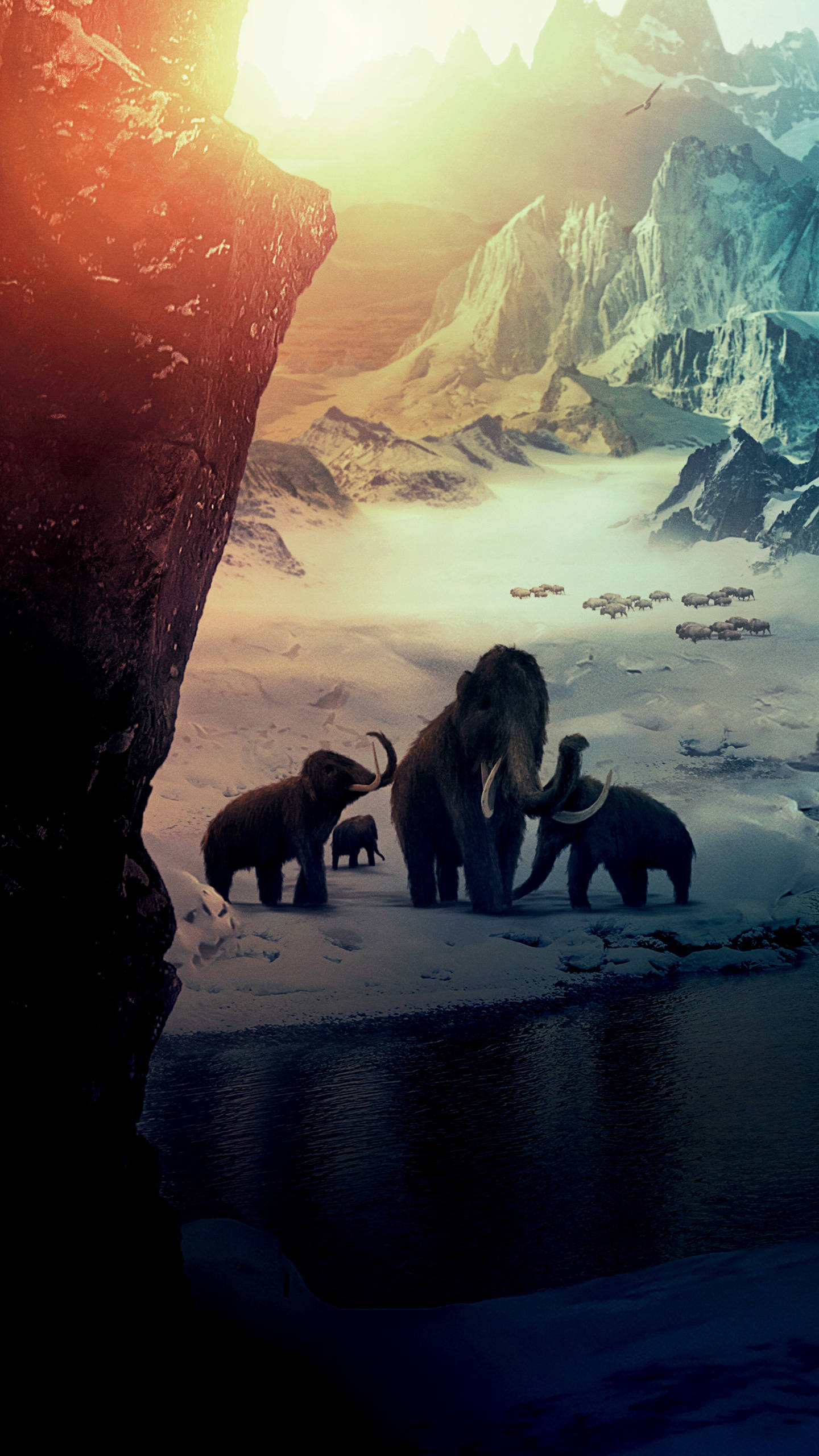 Cool Wallpaper Of A Group Of Mammoths In A Frozen Landscape During Sunset