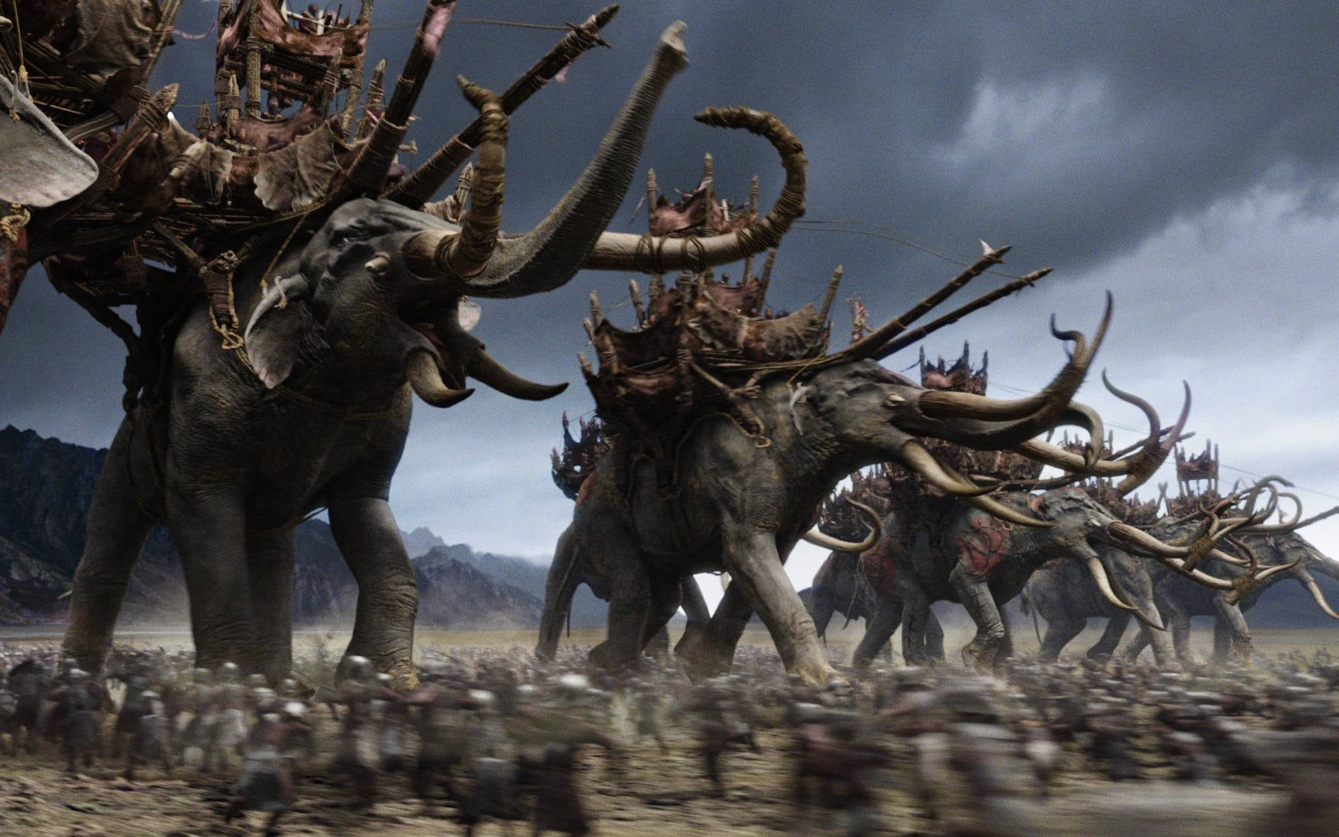 Giant Mammoths Accompanying Warrior Men In A Fight