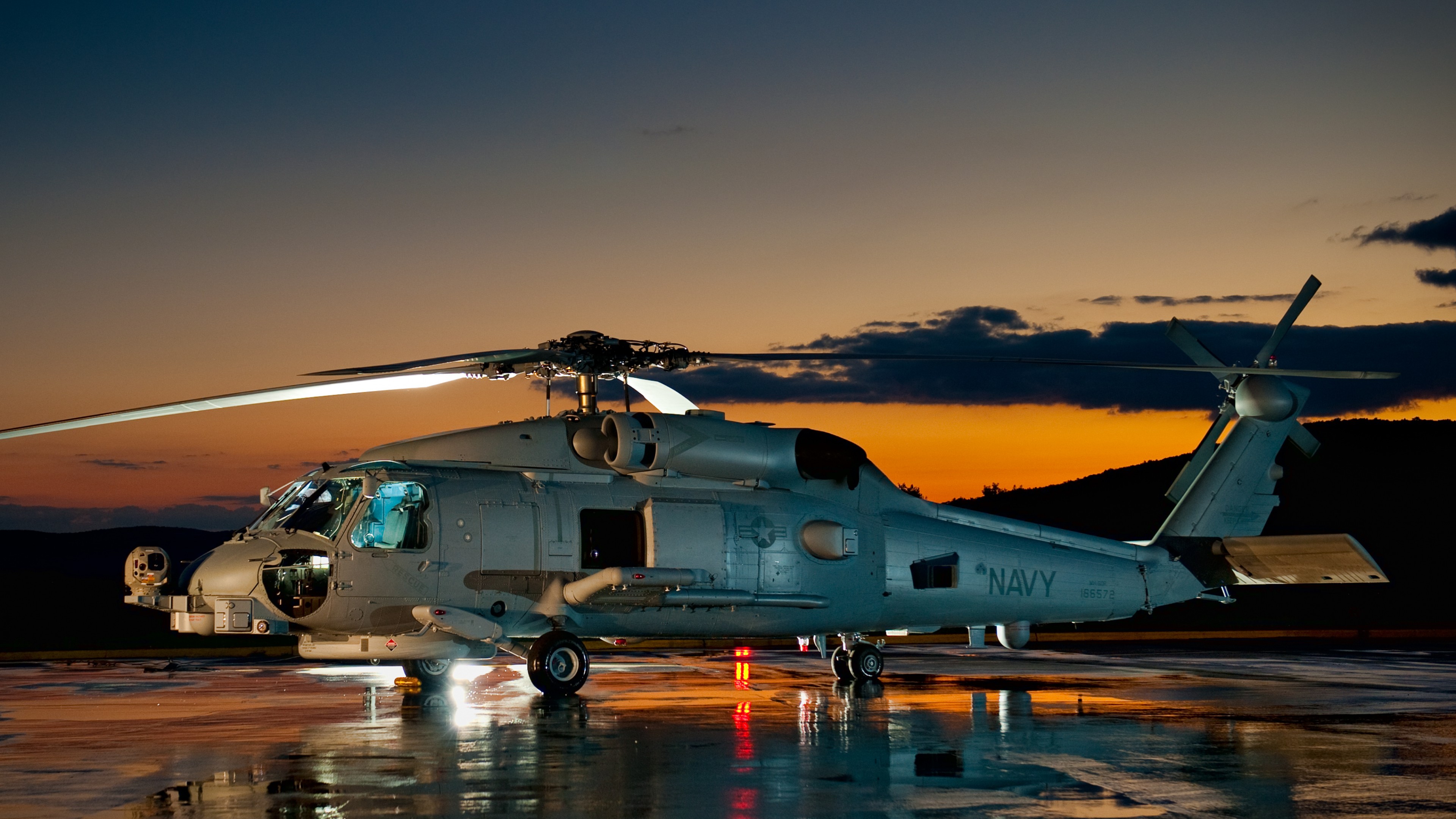 SH 60 Sikorsky MH 60 Sea Hawk multimission maritime helicopter U.S. Navy MEDEVAC sunset