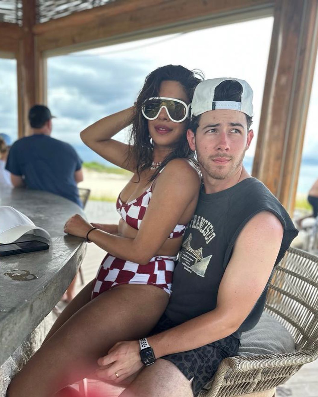 Priyanka Chopra takes a seat on Nick Jonas' lap on vacation