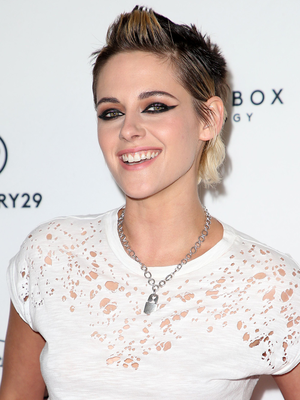 Kristen Stewart at the ‘Come Swim’ film premiere in Los Angeles, CA in 2017. She wore a white outfit and a brown and blonde mullet.