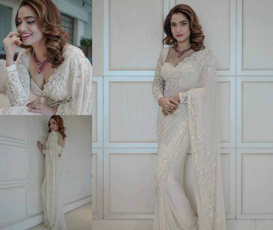 Ankita Lokhande is in a dazzling white saree with a floral work finish. It is often adorned with minimalistic embroidery and studded embellishments for a glamorous look.