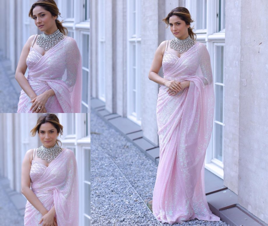 Ankita Lokhande looks gorgeous in a classic drape saree with a sequin all overwork and a dropped-end piece, often featuring a minimalistic design on elegant draping.